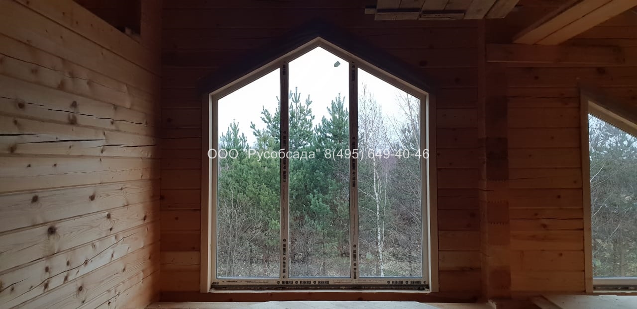 Скошенные окна в деревянный дом